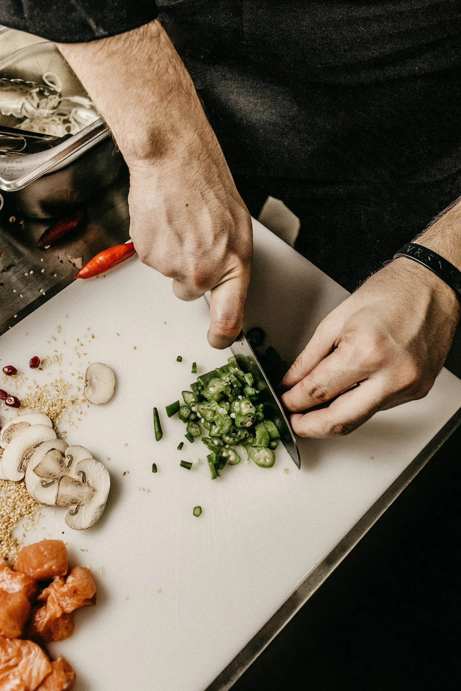 Chef chopping fresh ingredients